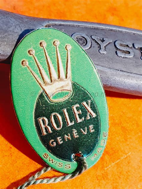 green hang tag Rolex